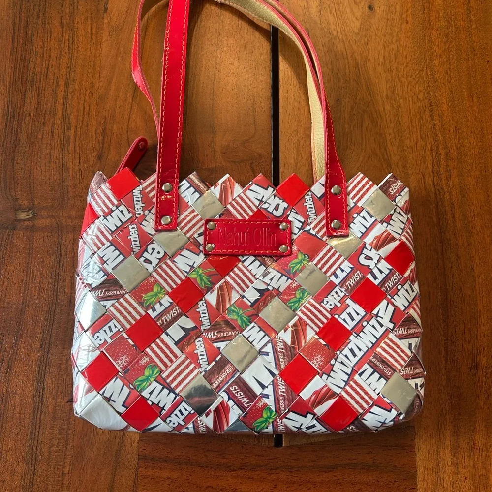 Nahui Ollin Red Twizzler bag